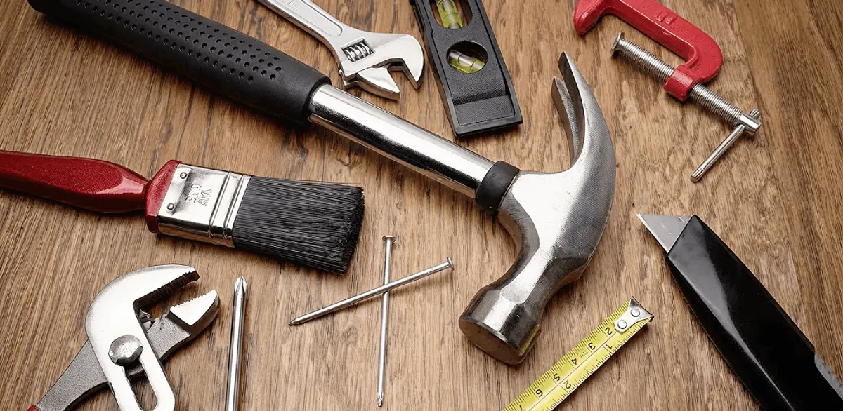 Handyman tools laid out for home repair and maintenance work in Charleston, SC